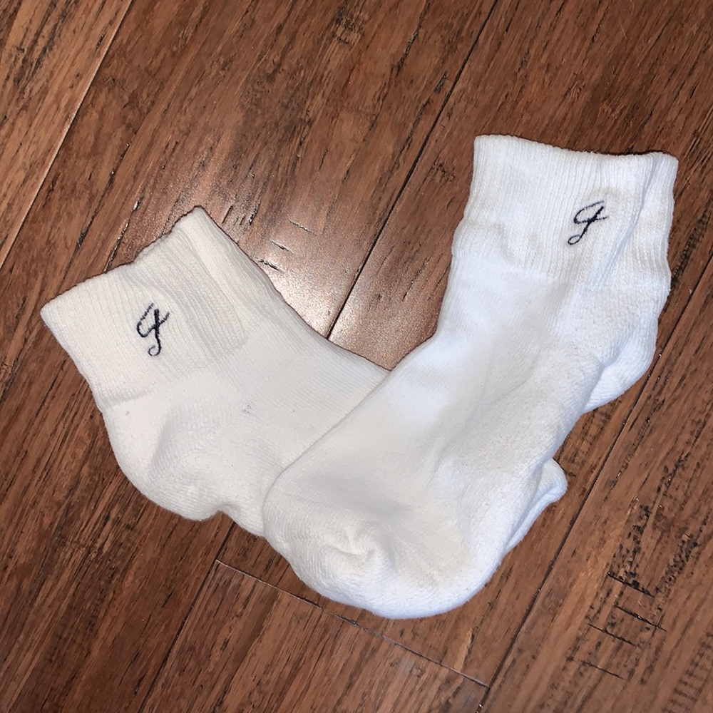 White socks with black emblem